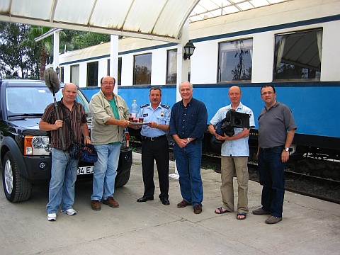 [ Serhan and the crew of 'Rick Stein's Mediterranean Escapes', Ankara Train Station in front of Atatürk's rail car ]